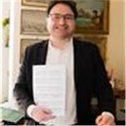 Compositore, pianista e arrangiatore, impartisce lezioni di pianoforte, Teoria e Solfeggio. Composizione