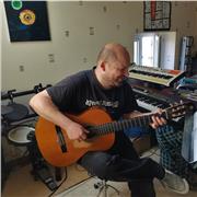 Professeur de guitare, basse et batterie