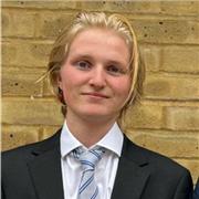 University student studying Physics. Online tutoring for Maths, Physics and Chemistry