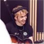 I am a professional guitarist who can give lessons to a range of skill levels, starting from absolute beginner