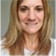 Spanish tutor teaching primary school children and adults