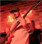 Versatile, groove-focused bassist blending technique and feel, teaching novice to intermediate players essential skills and theory