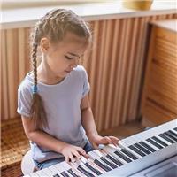 Profesor de piano, Guitarra y Ukelele para Niños y Adultos a Domicilio