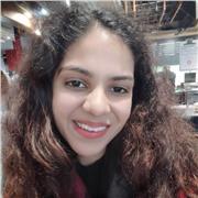 A passionate yoga teacher and instructor conducts yoga classes for women