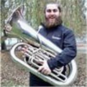 Music teaching providing brass instrumental lessons