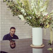 I am a passionate and patient piano tutor with a love for helping students discover the joy of playing music.