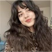 Friendly Turkish tutor helping students improve their speaking confidence, communication skills and personalised way