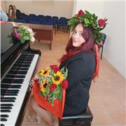 Insegnante di musica, teoria musicale, e pianoforte