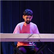 Profesor de Piano, musica arabe, clasico, y moderna