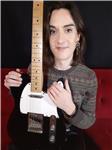 Guitar lessons for beginner-advanced and all ages. LGBTQIA+ friendly