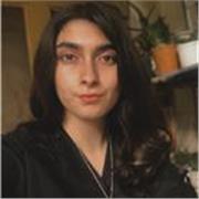 A young tutor whose lessons encompass a modern approach and strategies, assuring pupil satisfaction. 