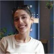 Friendly, patient teacher helping learners speak English confidently.”