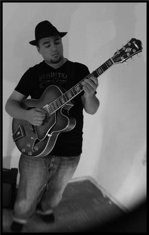 Profesor de guitarra. niños y adultos