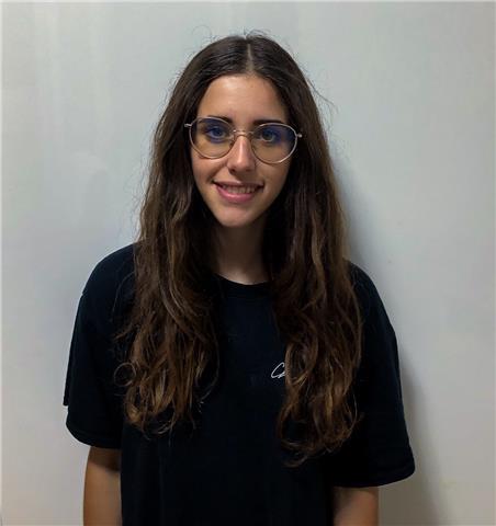 Studentessa con esperienze all’estero in materia