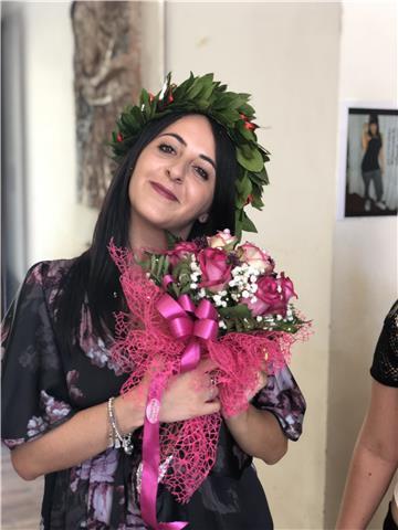 Laureata in tedesco e inglese, laurea specialistica voto 108/110