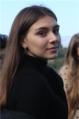 Profesora de música de niños pequeños, jardín musical