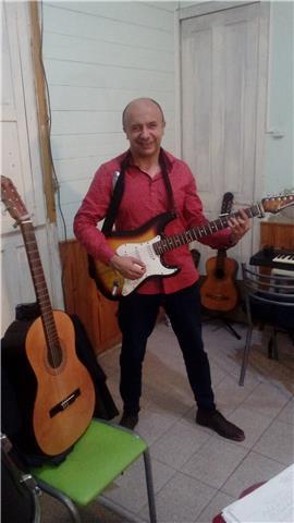 clases de guitarra,canto,grabaciones y musica en gral