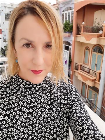 Native English speaker with 7 years ESL teaching experience